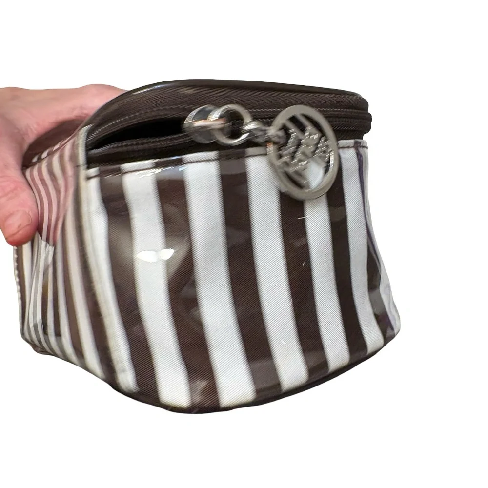 Henri bendel white & brown striped cosmeti case bag.